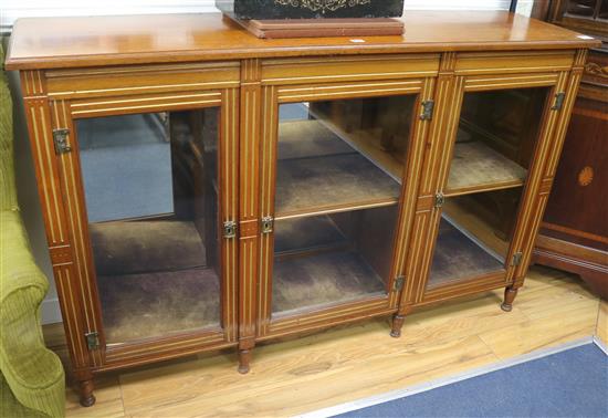 A Victorian parcel gilt walnut dwarf bookcase, W.152cm